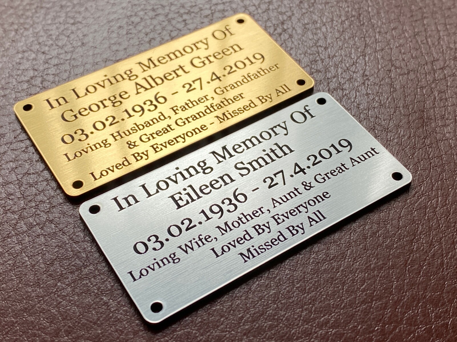 Pair of engraved memorial plaques in gold and silver