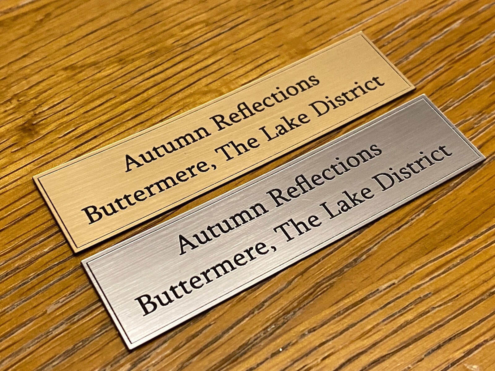 Brushed gold and brushed silver square-border plaques